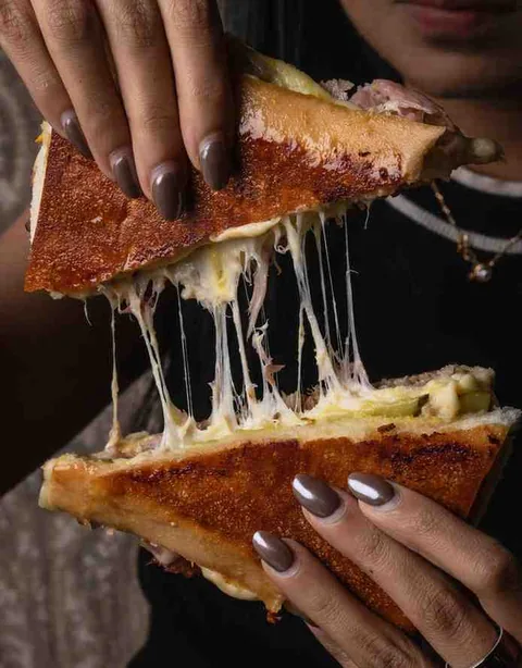 Cubano sandwich cheese pull