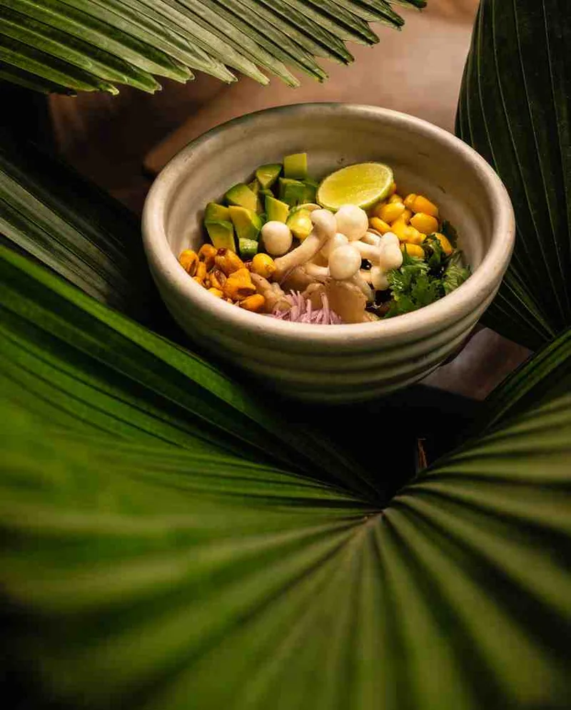 Ceviche bowl on palm leaves