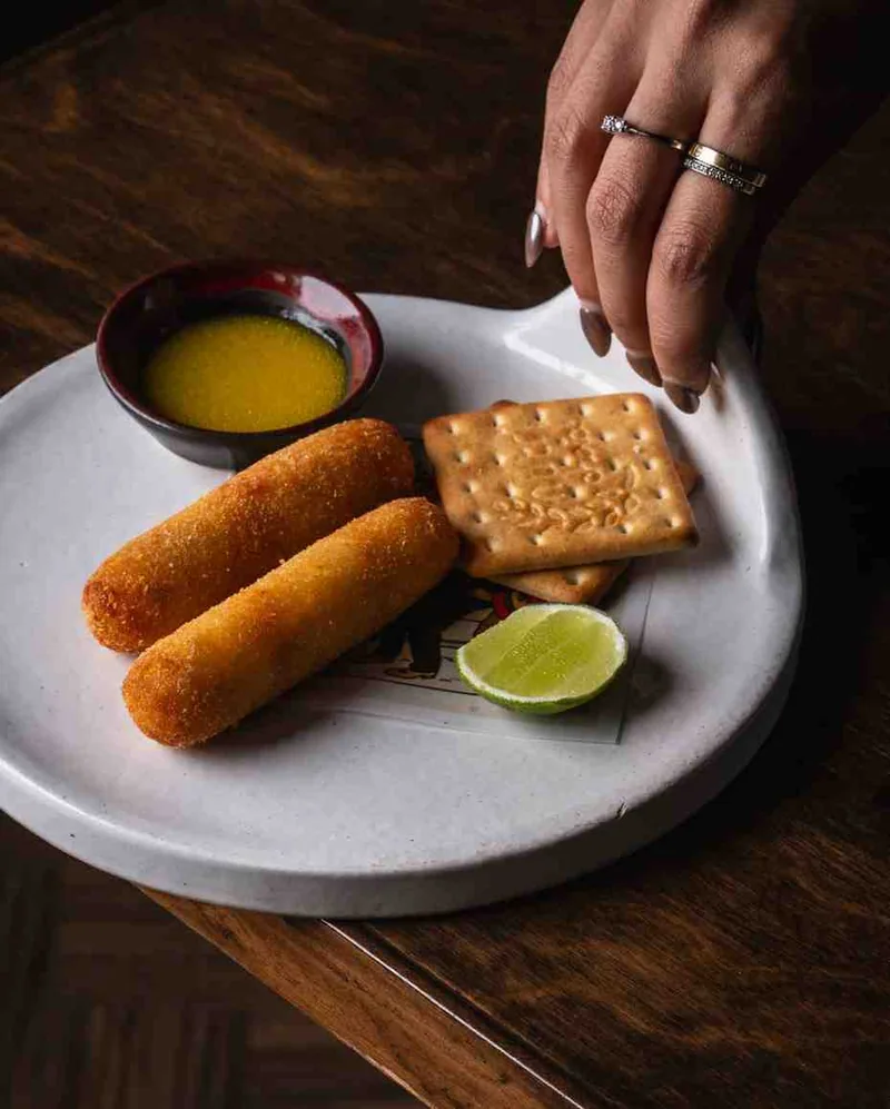 Golden croquettes with aji dip